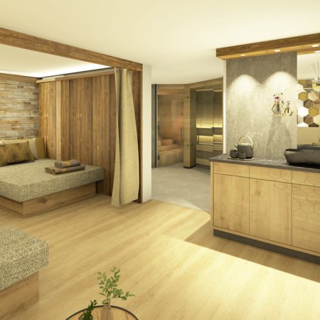 Helles Zimmer mit Holzverkleidung, Sofa links, Waschbecken rechts und Sauna im Hintergrund