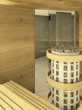 Innenansicht einer Sauna mit Holzverkleidung, Bänken und einem zentralen Ofen mit Steinen